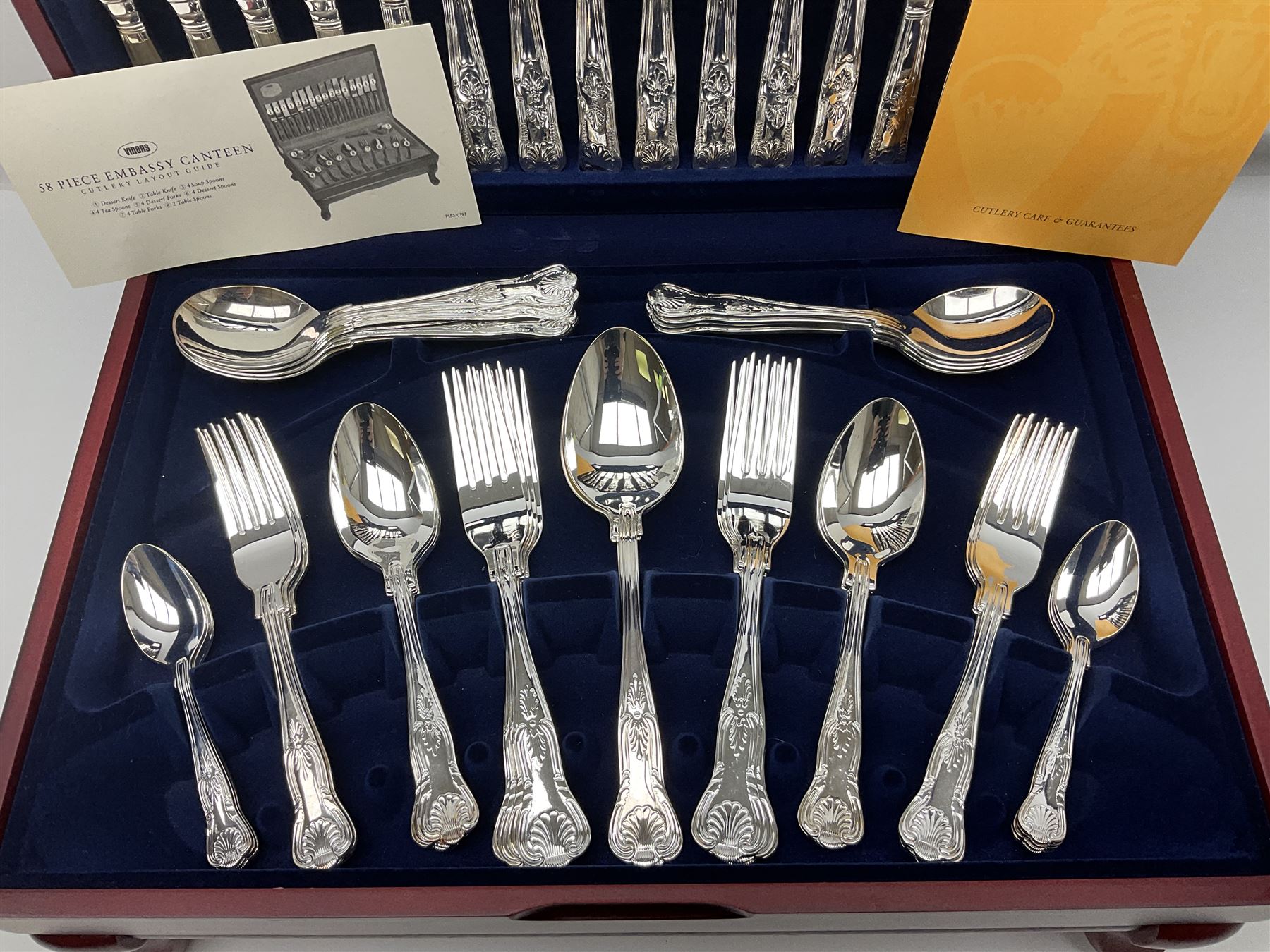 Viners Emassy canteen of Sheffield silver plated cutlery, 58 pieces, comprising eight table knives, dessert knives, dessert spoons, teaspoons, table forks, dessert forks, soup spoons, and two table spoons, housed in case with hinged lift up lid raised on four feet, L45cm