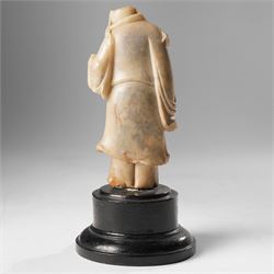 Soapstone carving of an immortal, possibly Zhongli Quan, on ebonised wooden base, including base H22cm