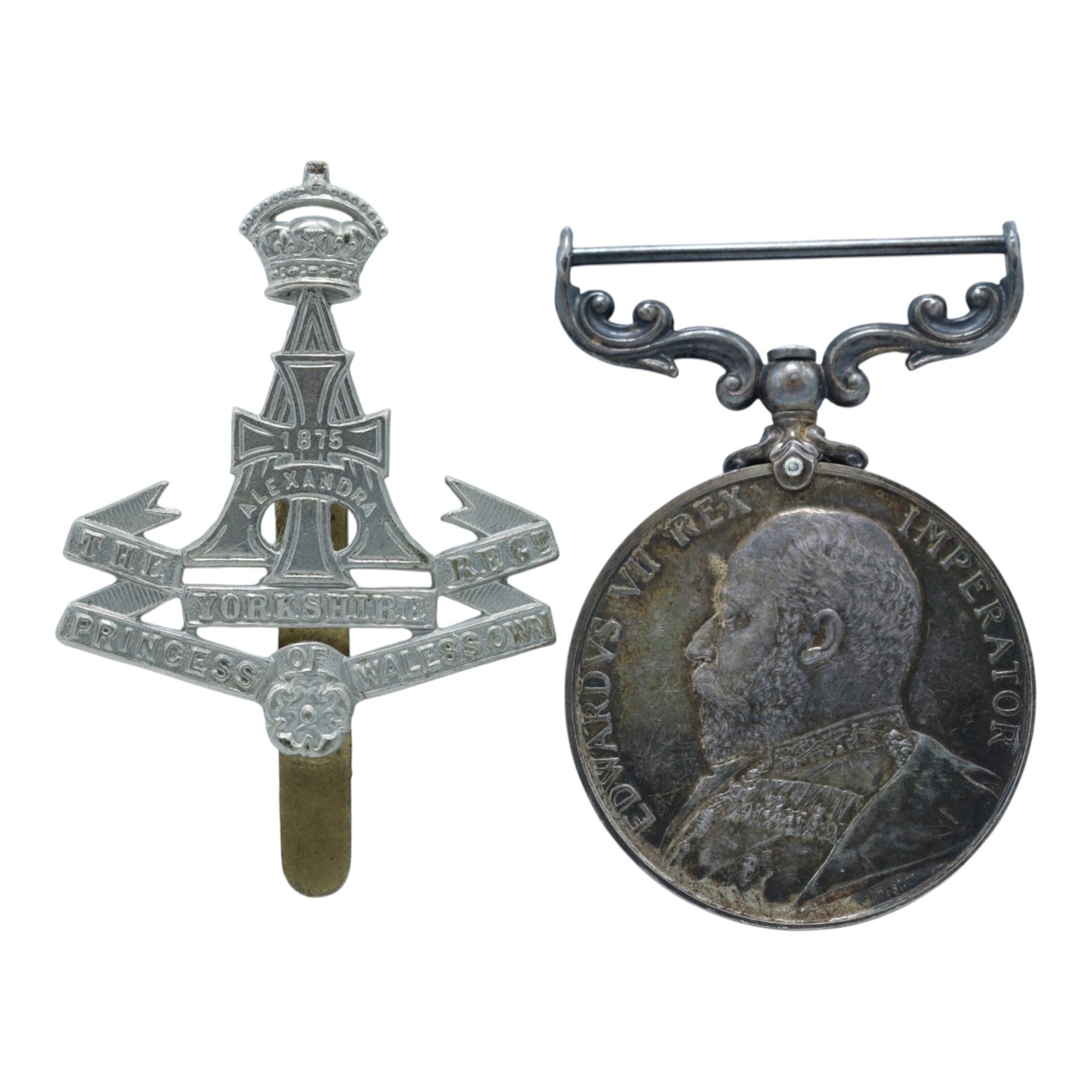 Royal Navy Long Service and Good Conduct Medal awarded to 'Pte H.C Oakman Suffolk Regt', together with a Yorkshire Regiment cap badge