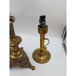 Brass candlestick with a knopt stems and triform base, together with two other brass candlestick 