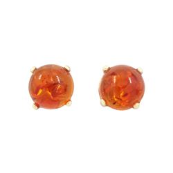 Pair of 9ct gold amber stud earrings, stamped