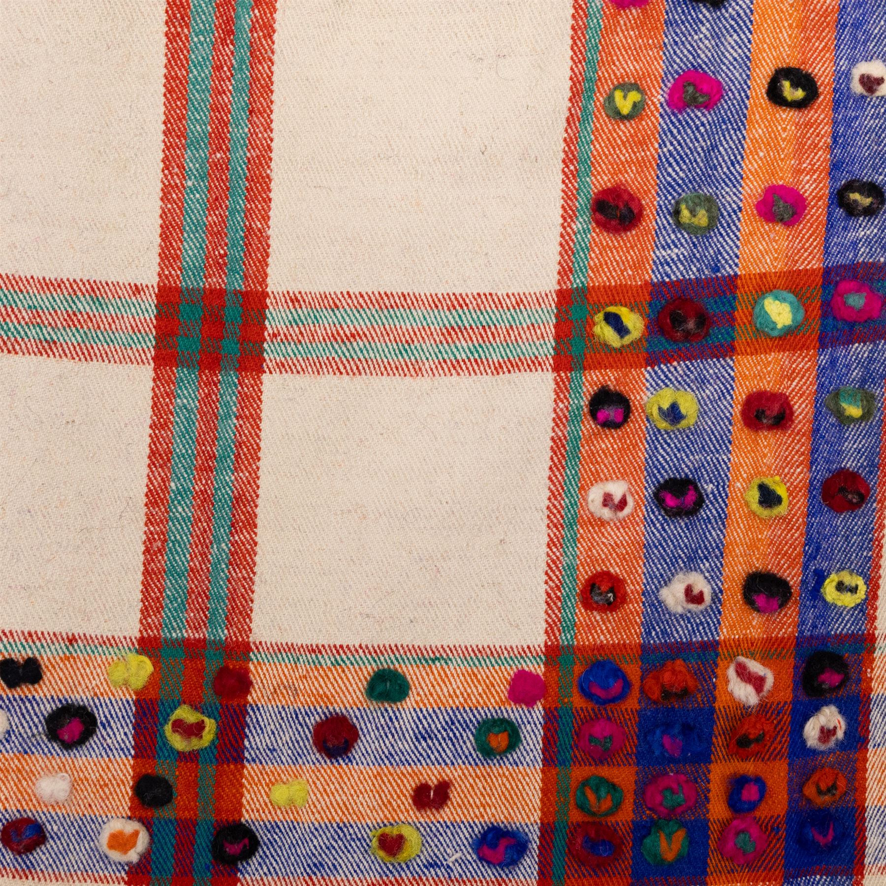 South West Persian Jajim flatweave kilim, ivory ground, woven with a bold checked and striped design in red and green, bordered by wide geometric polychromed bands decorated with circular tufts 