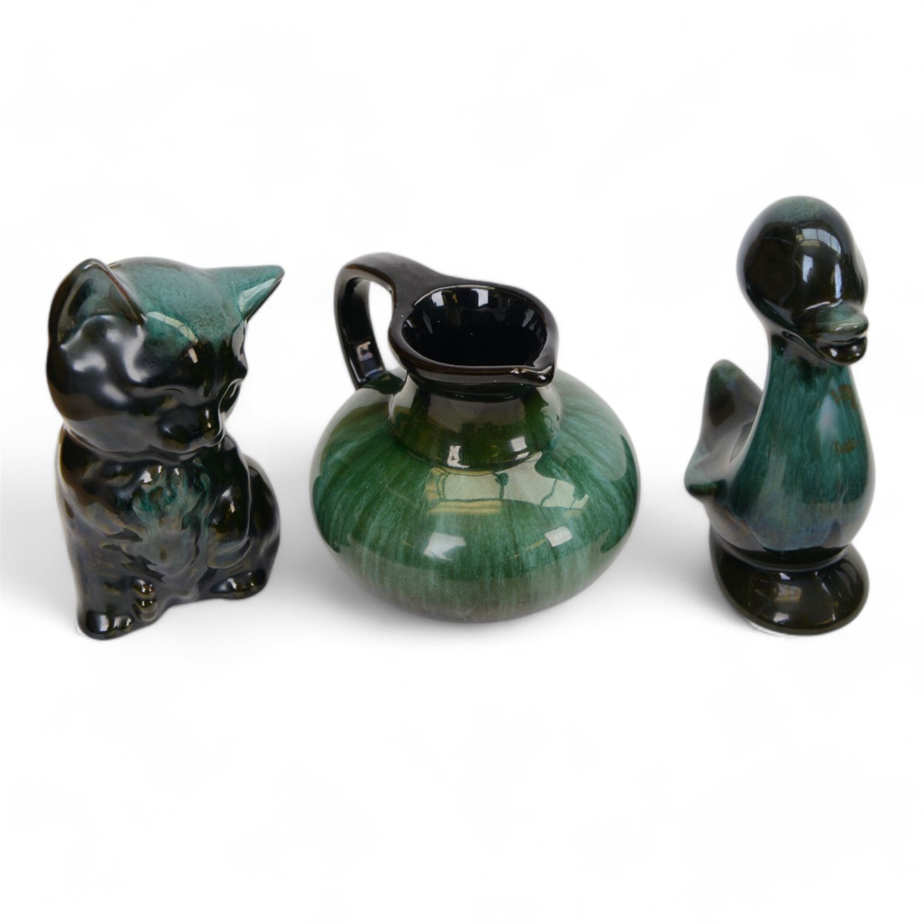 Collection of Blue Mountain Pottery, including owls, buffalo, deer etc, together with Poole Pottery Dolphins, owls frog etc 