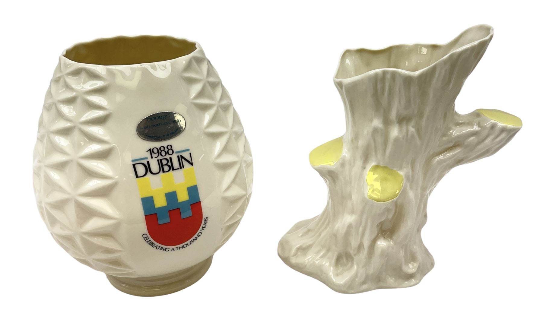 Donegal Parian China limited edition vase commemorating the millennium of Dublin in 1988 H16cm, together with a Belleek vase modelled as an open tree stump (2)