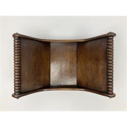 19th century mahogany cheese coaster, of typical curved form with turned bobbin ends, H19.5cm L40.5cm D26.5cm