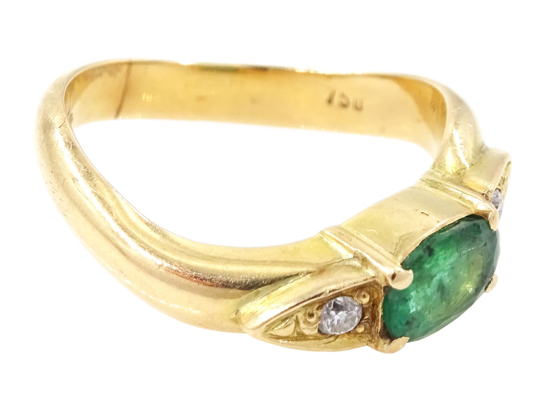 14ct gold emerald and diamond three stone ring, oval cut emerald with a round brilliant cut diamond set either side, to a wave design shank