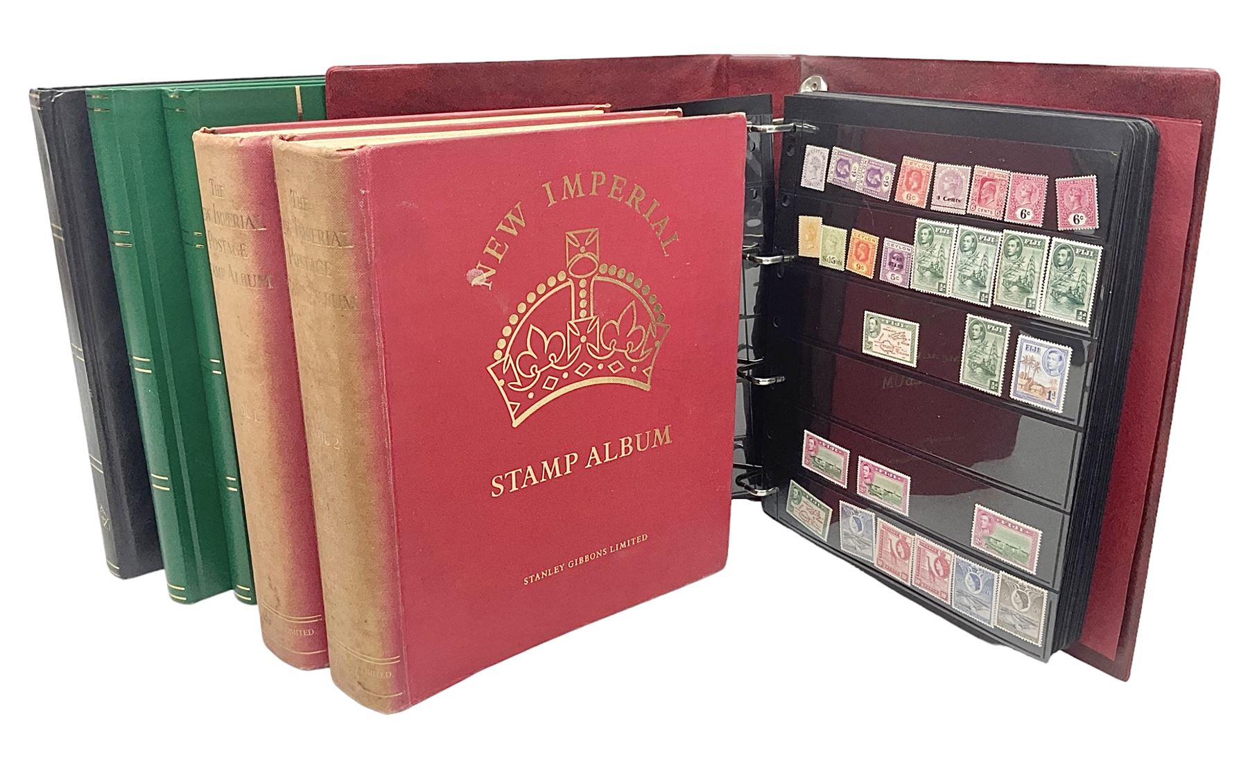 Stamps including St Helena, Fiji, Southern Rhodesia, Malaya, Bermuda, Queen Victoria and later Ceylon, various Universal Postal Union 1949 etc, housed in six albums/folders