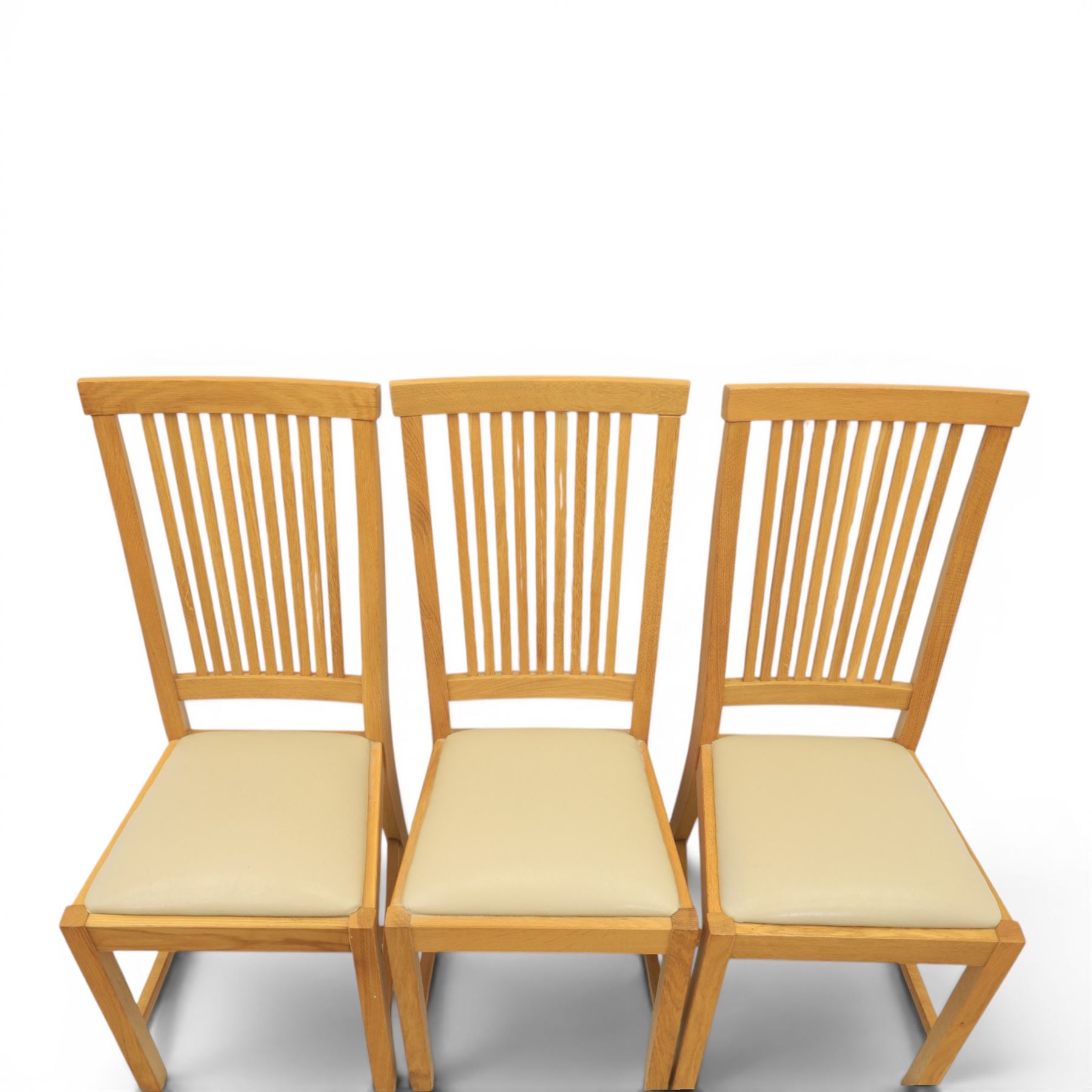 Contemporary oak dining extending table and set of six chairs, with additional leaf  extending to 182cm, chairs with cream upholstered seat