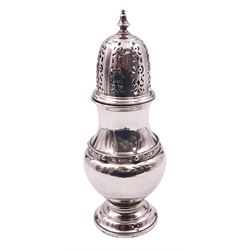 1930's silver sugar caster, of bellied form with decorative girdle and pierced cover, upon a circular stepped foot, hallmarked Adie Brothers Ltd, Birmingham 1939, H17cm, approximate weight 4.70 ozt (146.3 grams)