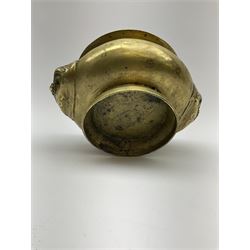 A eastern bronzed censer, of squat bellied form with twin zoomorphic handles, H9.5cm, rim D15cm.