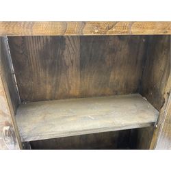 Oak dole cupboard / food hutch, the hinged panelled door with turned spindles enclosing a single shelf interior, H52cm D17cm W46cm