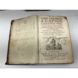 Three 17th century Lugduni (Lyon) printed books each with engraved title page in red and black comprising R.P. Corn Cornelii A Lapide .... Tomus Primus. 1690; R.P. Cornelii Cornelii A Lapide .... 1683; and Hortus Pastorum Sacrae Doctrinae Floribus Polymitus .... 1668. All folio with full calf bindings (3)
