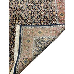 Persian blue ground rug, salmon border
