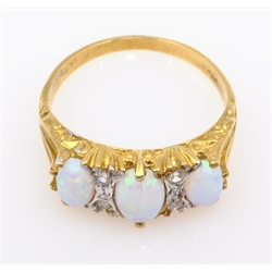  Three stone opal silver-gilt ring   