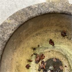 Large 19th century circular stone mortar planter on wrought iron stand