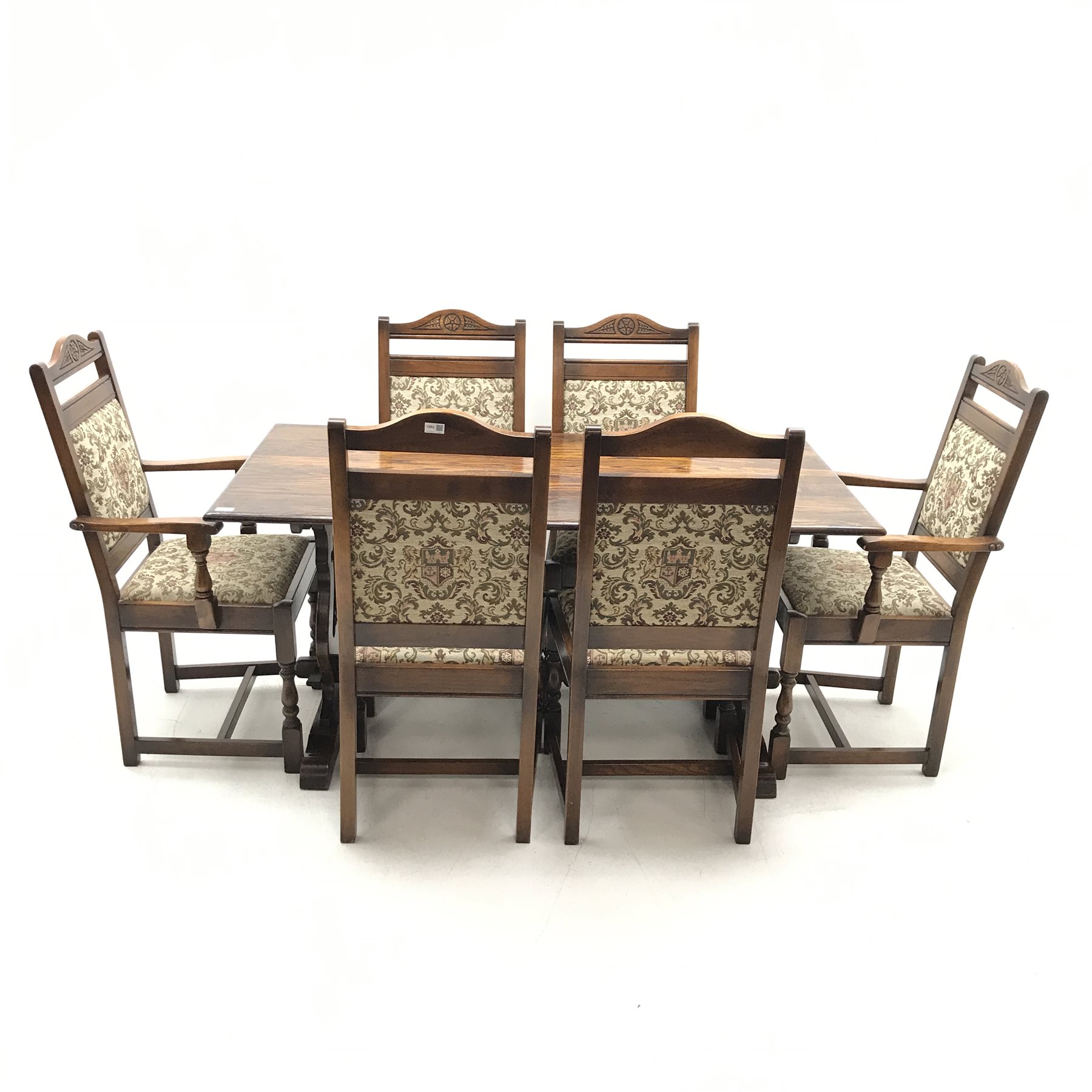 Old Charm - refectory style rectangular oak dining table, shaped and pierced end supports joined by stretcher on sledge feet (W153cm, H76cm, D82cm) and set six (4+2) oak framed dining chairs, carved and shaped cresting rail, upholstered splat and seat, baluster supports (W58cm)
