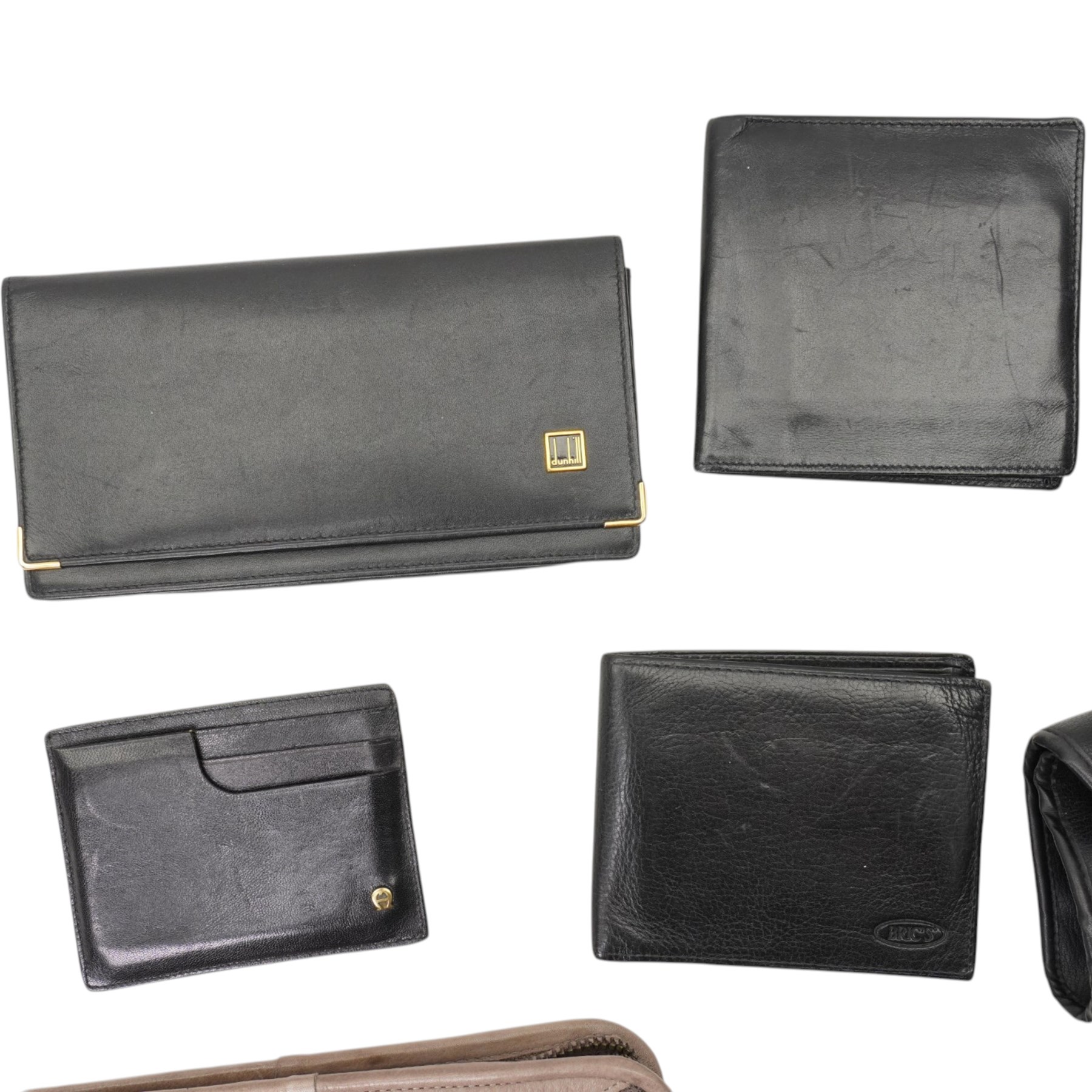 Collection of wallets, purses and bags, including MontBlanc key case and purse, Links London mini magic slate and case, Dunhill wallet and cheque book, Launer men's black leather wallet, Aigner card holder, Kurt Geiger black crocodile-embossed leather portfolio holder, etc (20)