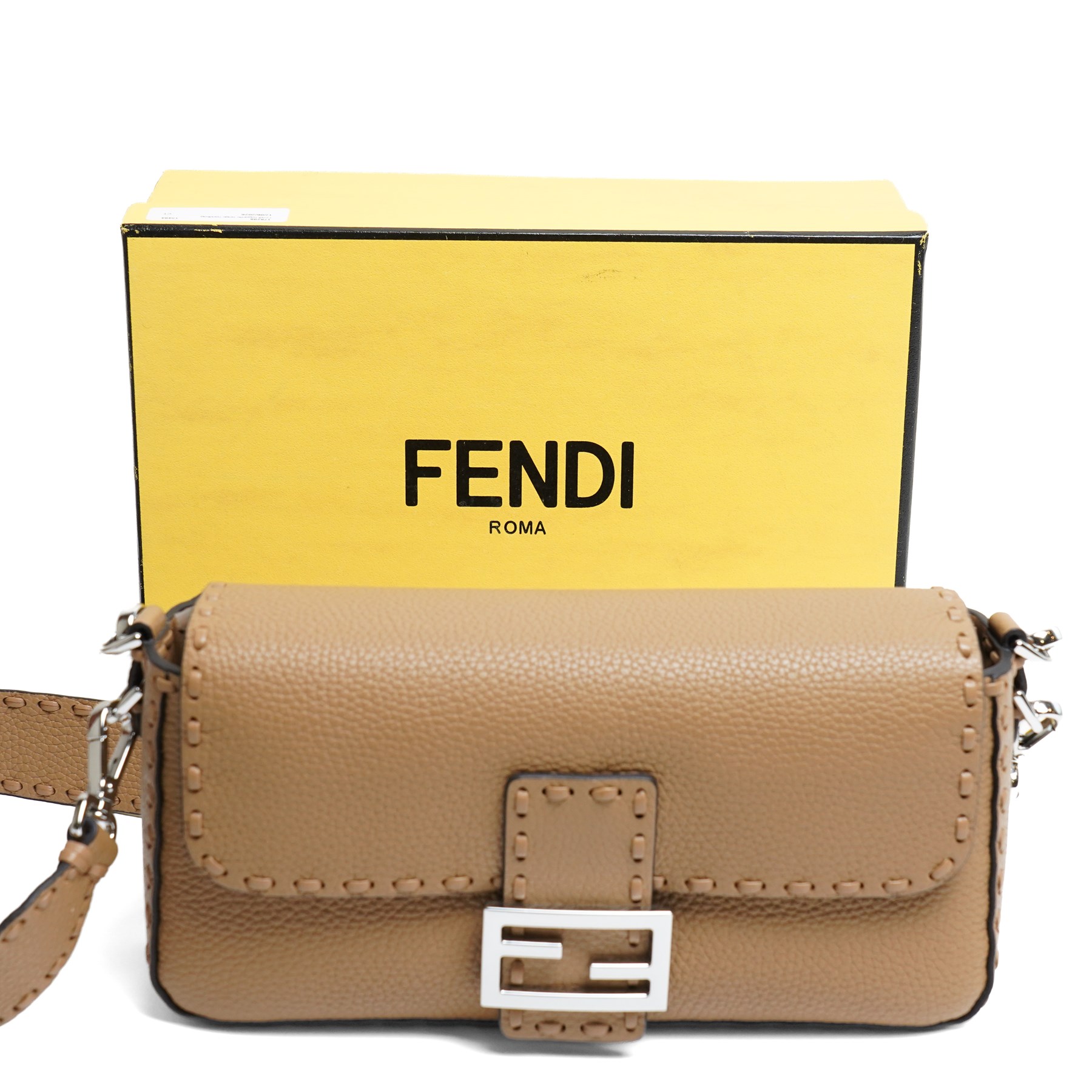 Fendi - Selleria Baguette shoulder bag, tan grained leather with hand-stitched detailing, palladium-tone FF buckle fastening, detachable leather top handle and shoulder strap, with authenticity card, dust bag and box