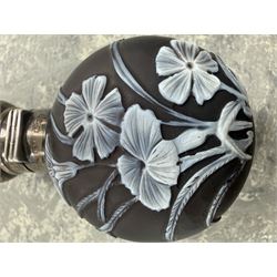 Victorian Thomas Webb silver mounted cameo glass scent bottle, hallmarked Sampson Mordan and Co, London 1884, the cameo glass body of circular form, decorated with white flowers and foliage in high relief upon a black ground, the hinged cover opening to reveal the original stopper, H6cm 