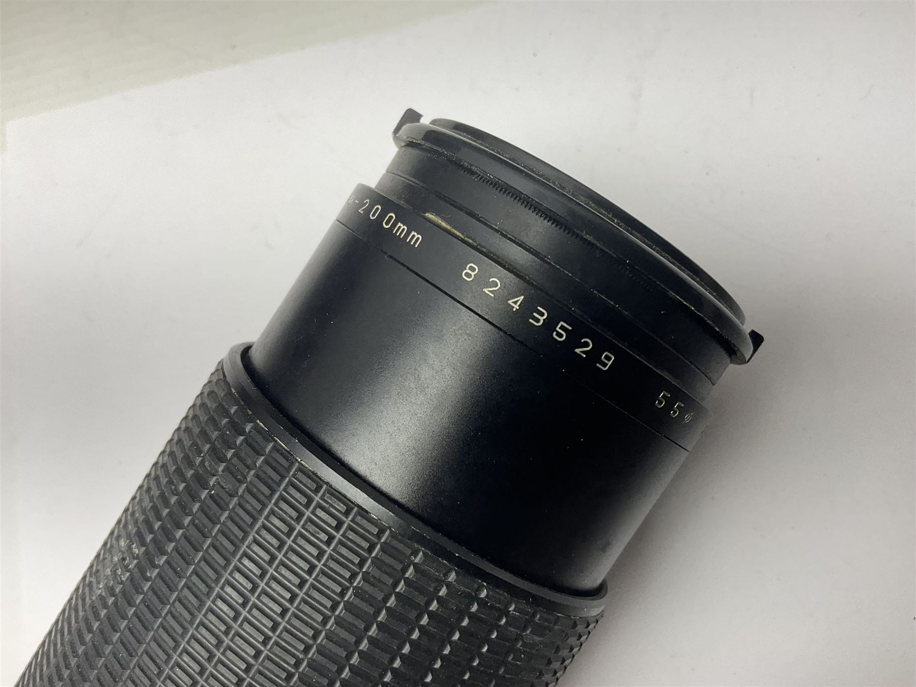 Cameras and accessories, to include Olympus OM101 Power Focus camera body, serial no 1076067, with 'Sigma AF Zoom 1:38, f=75 200mm' lens, serial no 2053714, Canon EOS 5000 camera body, serial no 1507812, with 'Canon Zoom EF 80-200mm, 1:4.5-5.6' lens, other cameras, by Miranda, Coronet and Ricoh and a collection of lenses, carry cases, etc 