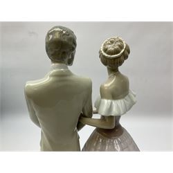 Lladro figure, An Evening Out, modelled as a man and women in evening dress, with original box, no 5540, year issued 1988, year retired 1991, H32cm 