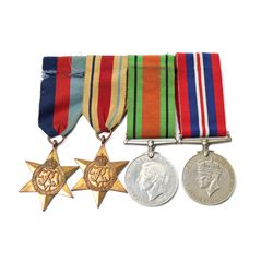 Group of five WWII medals comprising War Medal, 1939-1945 Star, Africa Star with 8th Army clasp, Italy Star and France and Germany Star, another group of War and Defence Medals, 1939-1945 Star and Africa Star, and a copy of the New Testament from George VI inscribed Leonard John Green, 3525653, RAOC, REME 1942, Att Black Watch 1944 and 1945 and Lee Enfield rifle number K91476