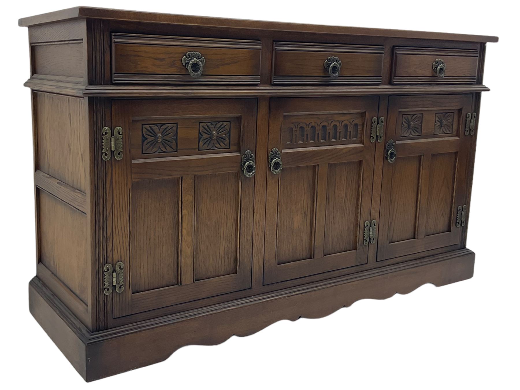 Old Charm Tudor style oak three drawer sideboard