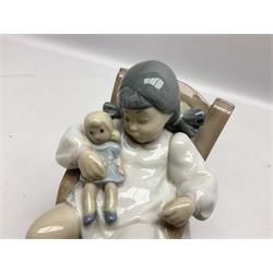 Two Lladro figures, comprising Naptime no 5448 and Sweet Girl no 4987, together with a Lladro collectors plaque, largest example H27cm