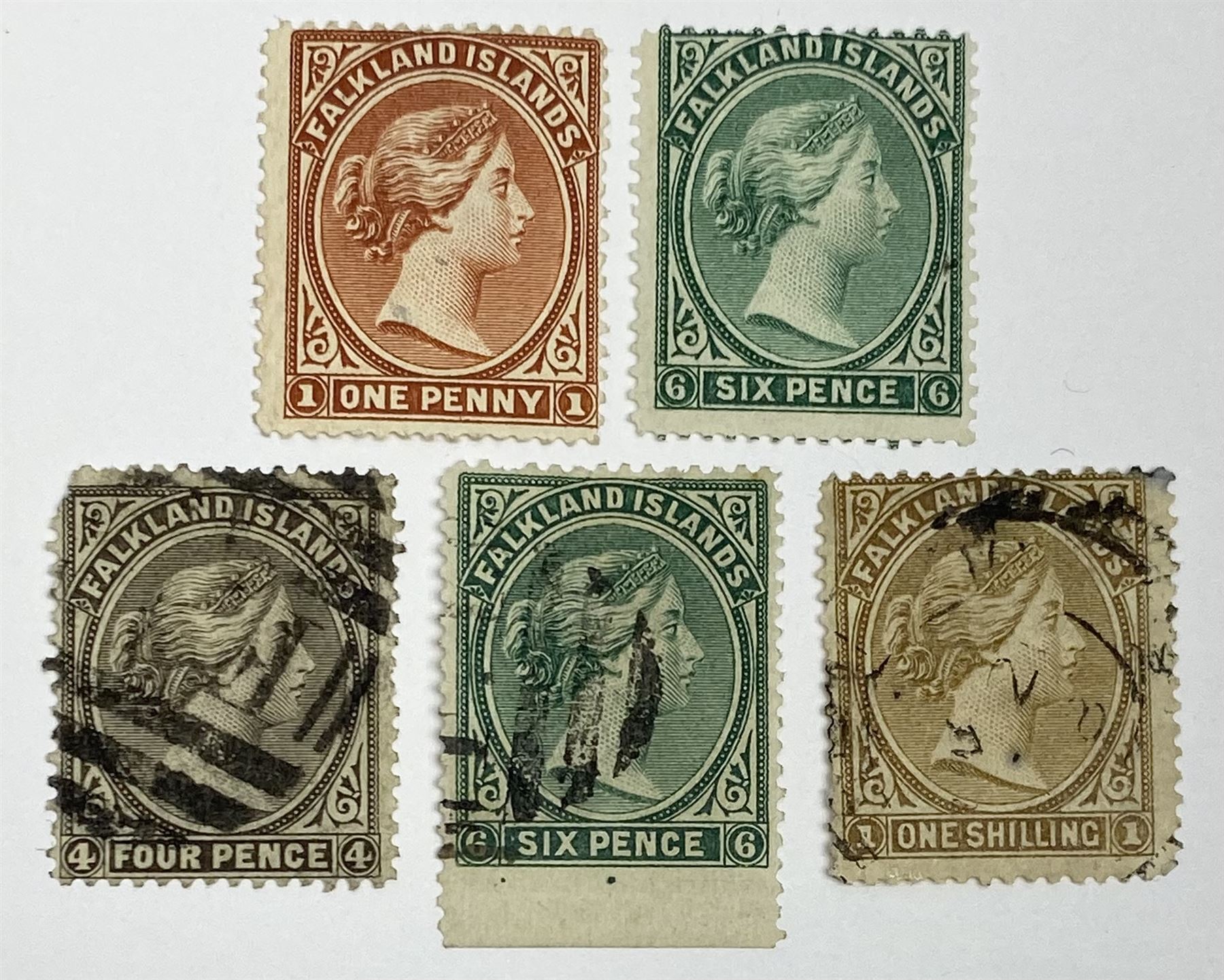 Falkland Islands Queen Victoria 1878 one penny and six pence stamps, both unused and four pence, six pence and one shilling, used, all previously mounted