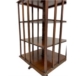 Edwardian mahogany revolving library bookcase, square form with four tiers