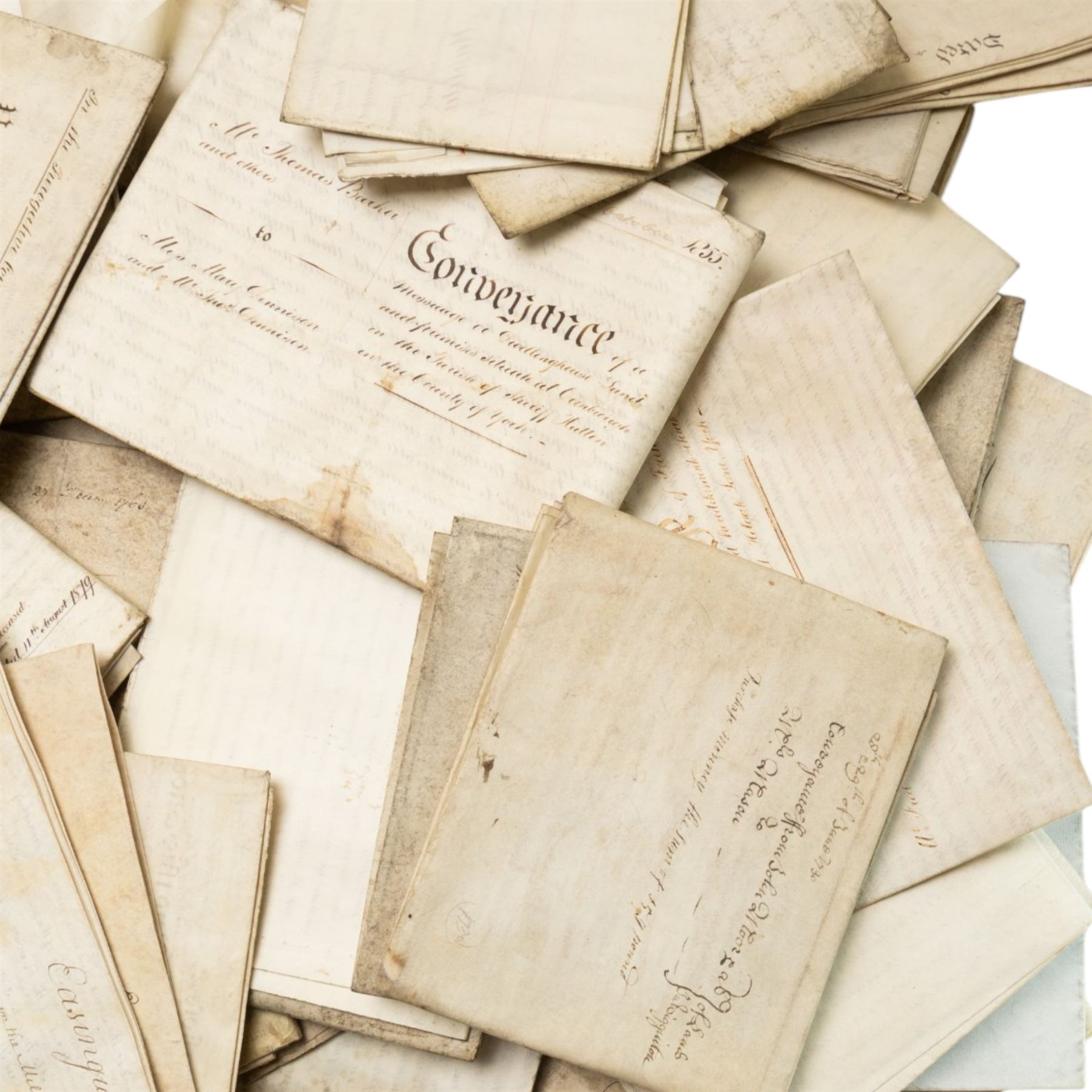 Yorkshire and miscellaneous deed interest - large collection of 18th and 19th century vellum indentures, wills, probate documents and property papers relating to wider Yorkshire towns and villages including Malton, Northallerton, Easingwold, Scarborough, the Humber, Barnsley, Ecclesfield, Great Leavening, Barton in the Willows, Flaxton and other areas, with documents concerning farmers, yeomen, tradesmen and landed families, many retaining wax seals and revenue stamps, together with a small quantity of non-Yorkshire and overseas-interest material including probate of Knobel Louis Benjamin du Gue, formerly of Brindisi, Italy, steam shipping agent, later of St Leonards-on-Sea, Sussex,  in one large box