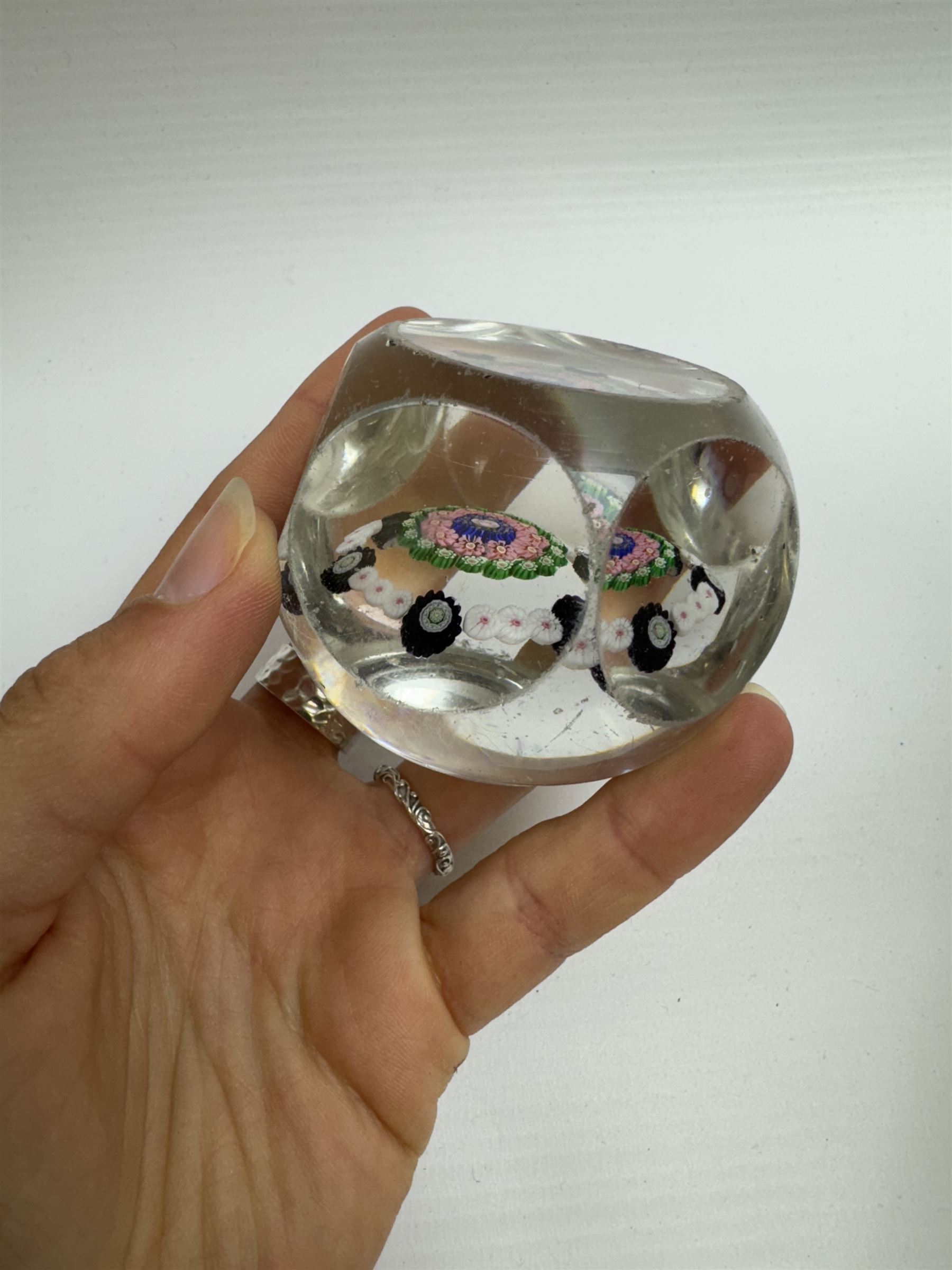 Glass Millefiori paperweight of hexagonal faceted form, H5cm