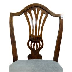 Early 19th century elm side chair, shaped cresting rail over vasiform splat with pierced decoration (W53cm, H96cm); Hepplewhite period mahogany side chair, shield back with pierced splat, on square tapering supports with spade feet (W55cm, H99cm); George III walnut elbow chair, shaped cresting rail and moulded frame, upholstered drop-in seat, on square supports with inner chamfer (W59cm, H95cm) (3)