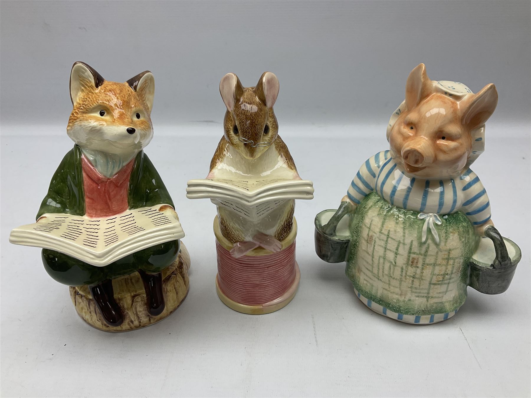Nine Border Fine Arts and Enesco Beatrix Potter money boxes, to include Peter Rabbit, Benjamin Bunny, Mrs Tiggy-winkle, jemima puddle duck etc  