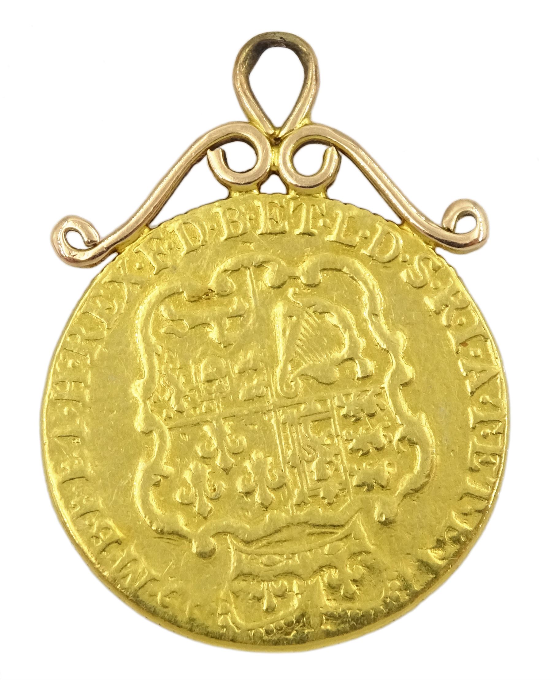 George III gold guinea coin, with soldered gold mount