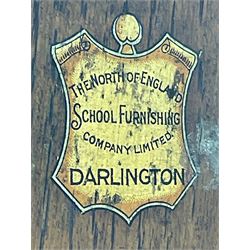 The North of England School Furnishing Company Limited Darlington - early 20th century oak school cupboard, projecting moulded cornice over two panelled doors, fitted with shelves, on chamfered plinth base 