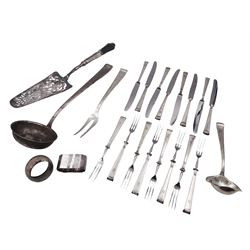 Continental silver and white metal flatware, comprising cake slice, two ladles, carving fork, eight silver handled knives and eight silver handled forks, mostly stamped 800, together with two silver napkin rings, hallmarked, approximate weighable silver 18.55 ozt (577.1 grams)