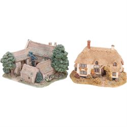 Eight Lilliput Lane models, comprising Heritage Collection Buckingham Palace, Crown Inn, Anne Hathaway, Periwinkle Cottage, Royal Oak Inn, Through The Keyhole, Burley Street Garage and The George Inn
