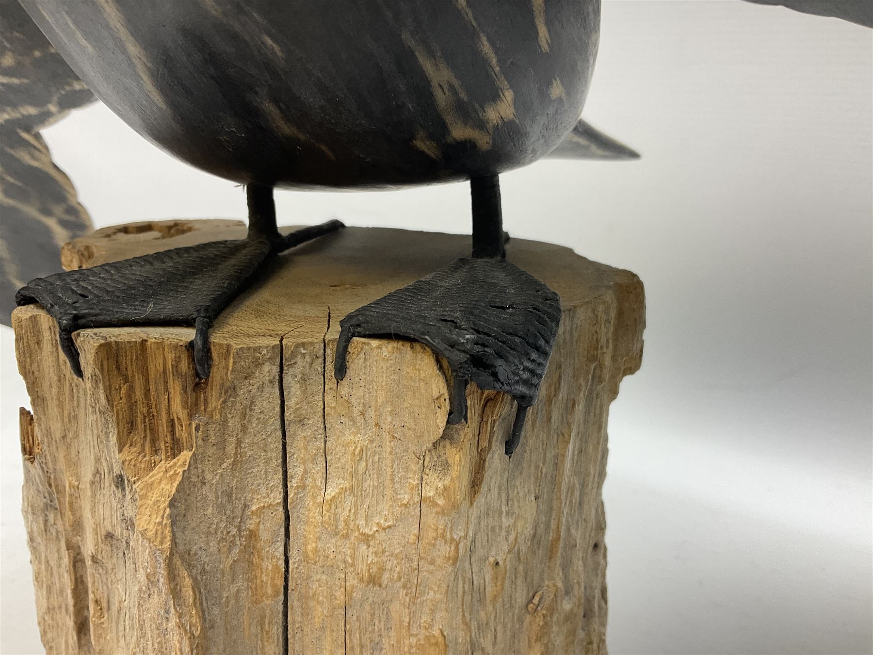 Wooden sculpture of Cormorant aquatic bird on a naturalistic wooden plinth, H46cm
