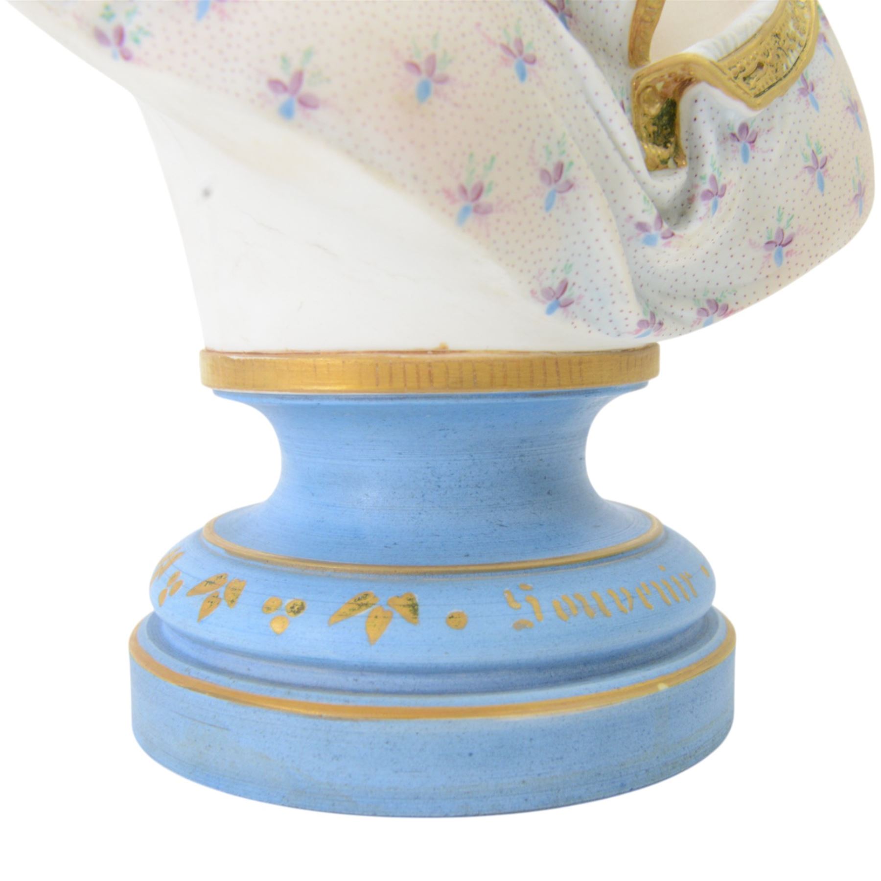 Late 19th century French Limoges bisque porcelain bust, by Henri Ardant, modelled as a young maiden with ribbon and rose in her hair, after A. Carrier, upon a blue socle base entitled 'Souvenir' in gilt, marked beneath, H37cm

