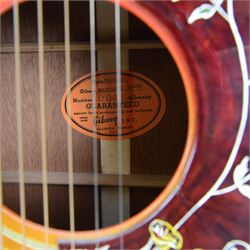 1968 Gibson Hummingbird acoustic guitar, with sunburst finish, serial no. 500460, inlaid mother of pearl fret markers, inlaid pick guard, bound fingerboard and sides, original adjustable bridge, original tuning pegs, contained within hard case, guitar length 104cm