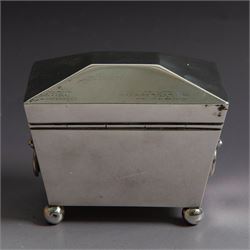 Early 20th century silver tea caddy, of sarcophagus form with twin lion mask mounted loop handles, upon four bun feet, hallmarked William Hutton & Sons Ltd, Birmingham 1913, H8cm, W9cm