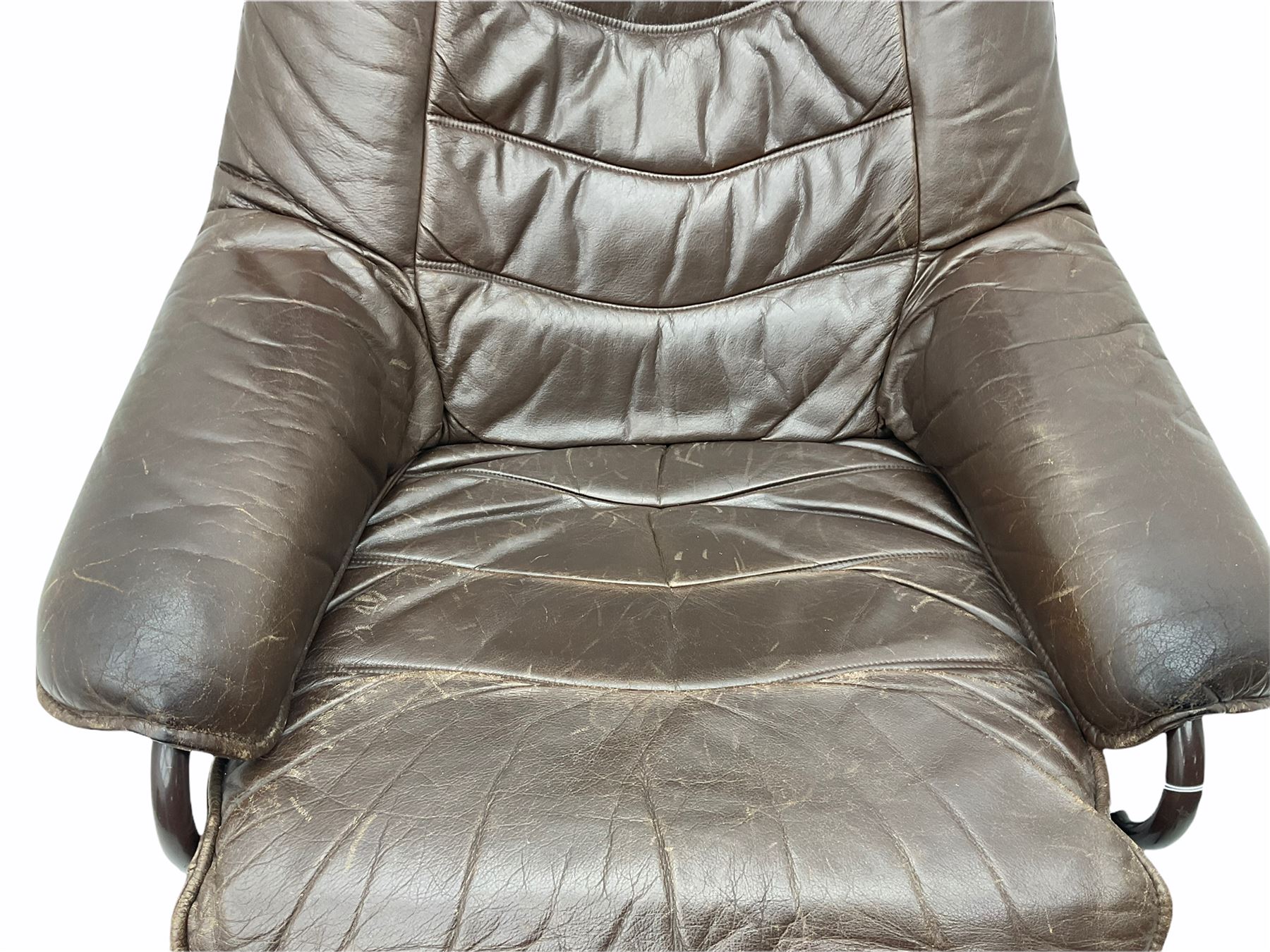 Skoghaug Industries - Leather reclining swivel armchair and matching footstool