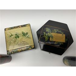 Mauchline ware black lacquered octagonal bobbin box, the hinged cover with forget-me-not floral decoration and sentimental verse, opening to reveal six bobbin holders and retail label for Clark & Co, together with a Mauchline ware sewing box, with floral decoration throughout and verse to hinged cover, a similar black lacquered needle holder and a Mauchline Tartan ware needle holder, largest diameter D11.5cm