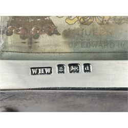 Edwardian silver mounted playing card case, hallmarked William Harrison Walter, Birmingham 1903, the sides each with a period playing card set behind a bevelled glass panel, the hinged cover with later engraving 'Presented to Norman T Crombie Esq by the officers & men of the 31st WR Detachment for services rendered 1917-1918', with red leather lined interior, the three compartments upon a sprung base and containing two later wooden Whist markers, case H12.5cm