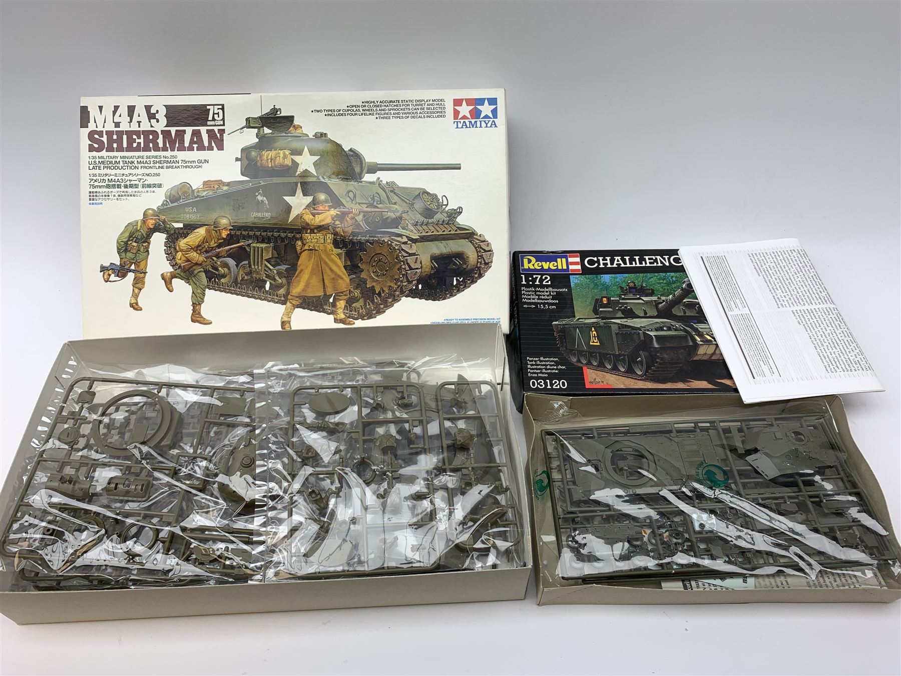 Seven plastic model construction kits - Airfix Vodaphone McLaren Mercedes racing car and Jaguar 'E' Type, Revell Ferrari F310B racing car and four tanks by Airfix, Revell and Tamiya; all boxed in factory sealed transparent packaging; together with an Airfix Spitfire kit tin, various model instruction sheets, catalogues and magazines.