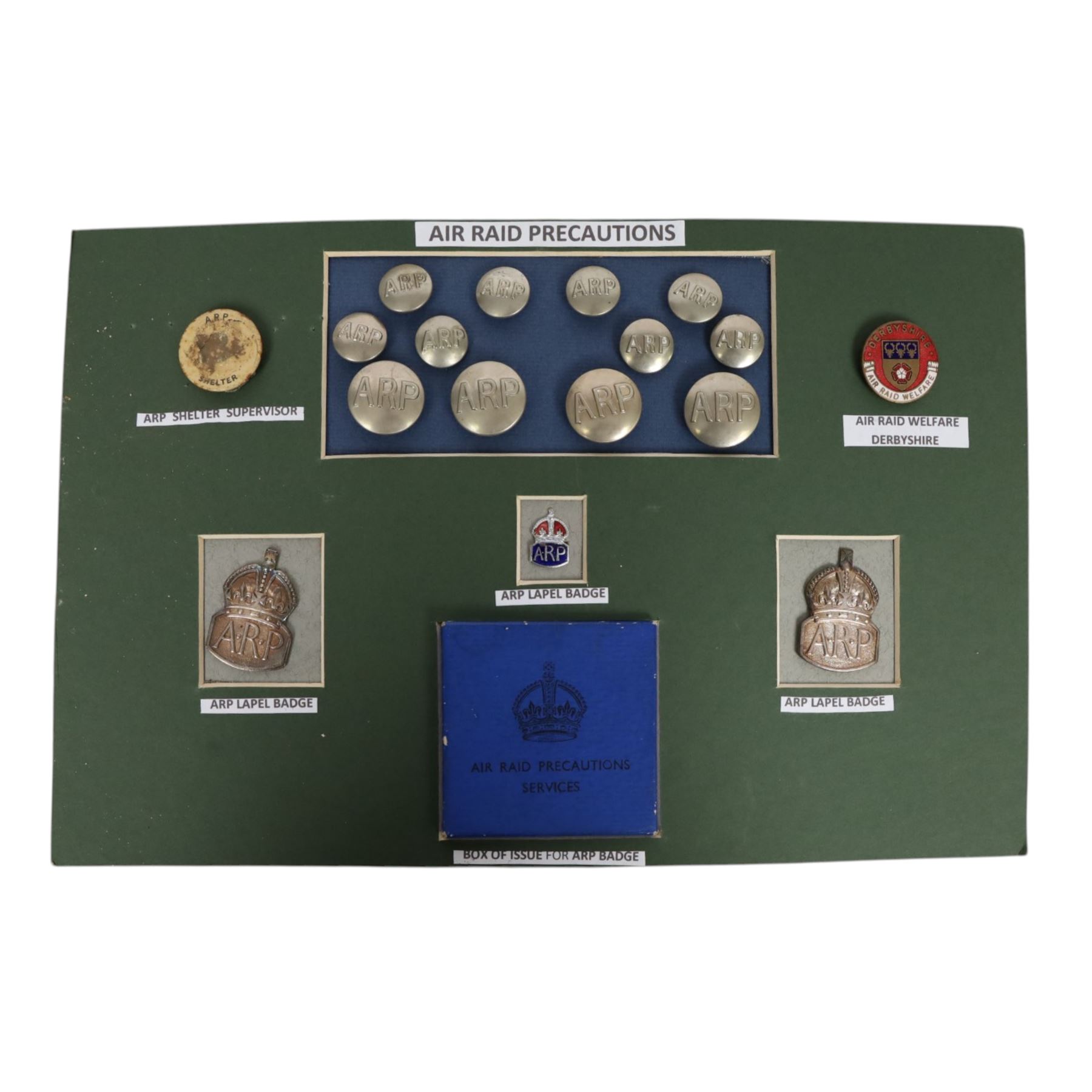 Air Raid Precautions items, including four door plates, silver lapel bedges, Women's Voluntary Service, whistle, matchbox etc  