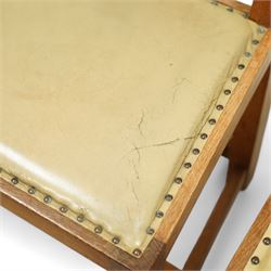 Mouseman - set of eight (7 + 1) oak dining chairs, pierced and carved lattice back over leather upholstered seat, on octagonal front supports united by stretchers, carved with mouse signature, by the workshop of Robert Thompson, Kilburn