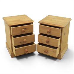 Pair of solid pine three drawer bedside pedestal chests
