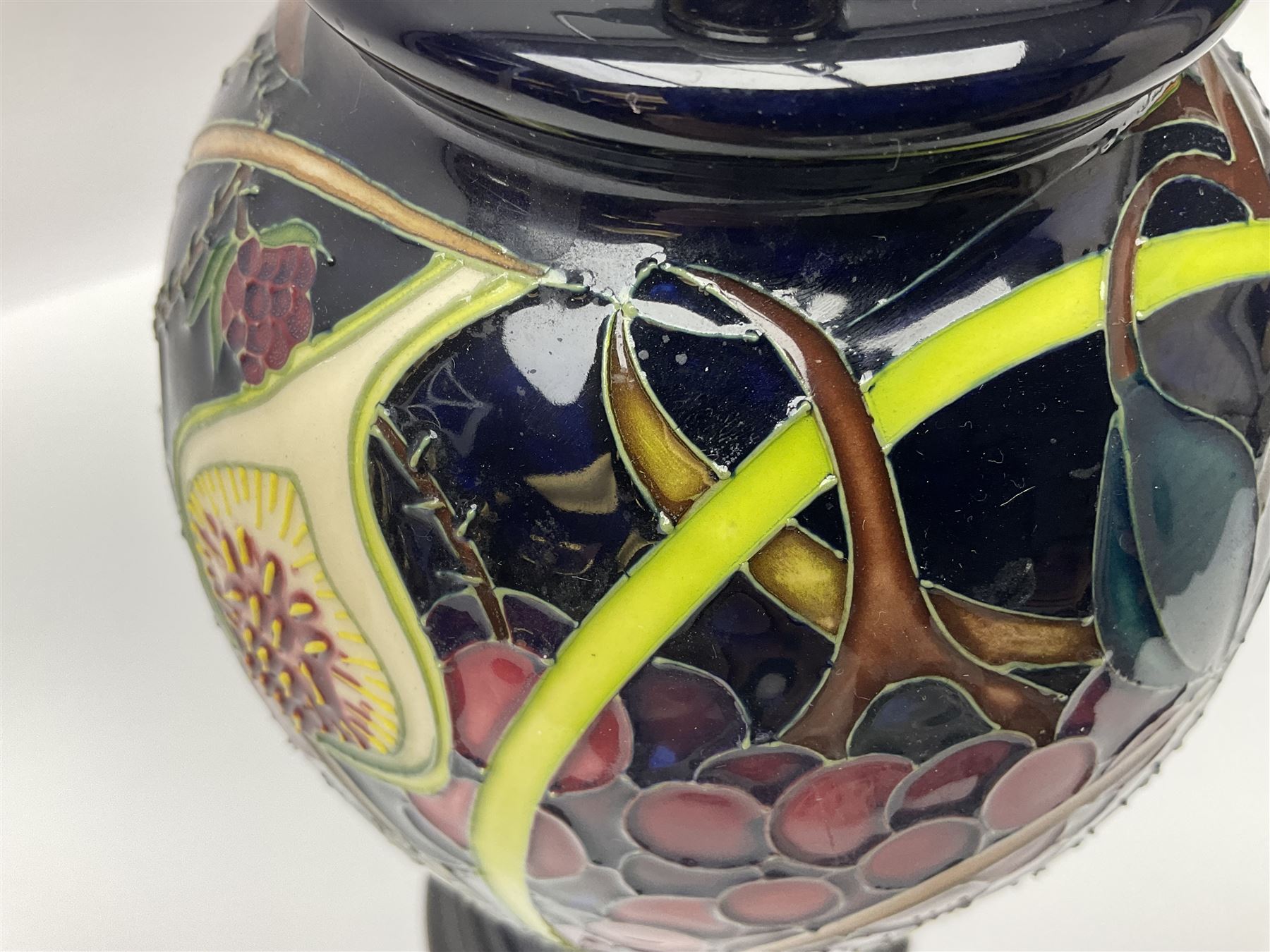 Moorcroft table lamp of baluster form, decorated in the Queens Choice pattern by Emma Bossons, H49cm